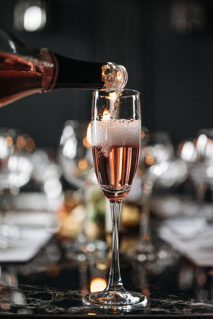 Clear Wine Glass With Brown Liquid